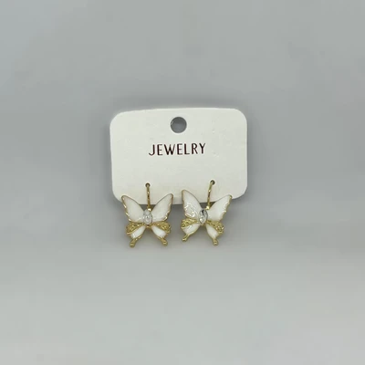 Boucles d'oreilles pendantes papillon couleur blanche et dorées avec strass