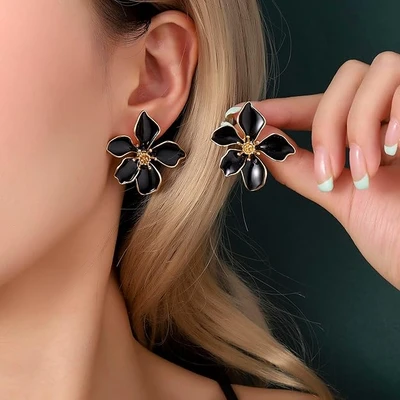 Boucles d'oreilles clous fleur noire et dorée